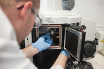 Scientist performing inductively coupled plasma optical emission spectroscopy
